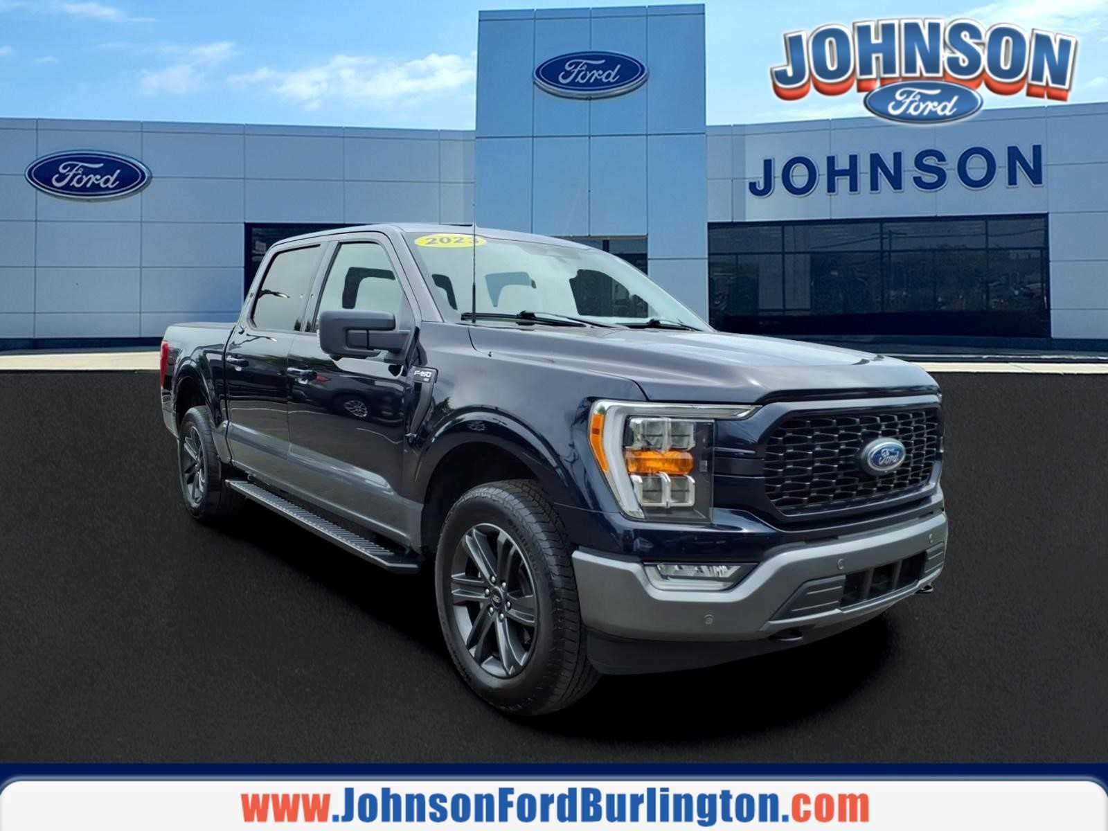2023 Ford F-150 XLT in Antimatter Blue/Carbonized Gray — front three-quarter view